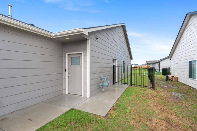 Property entrance featuring a patio and a gate | Image 6