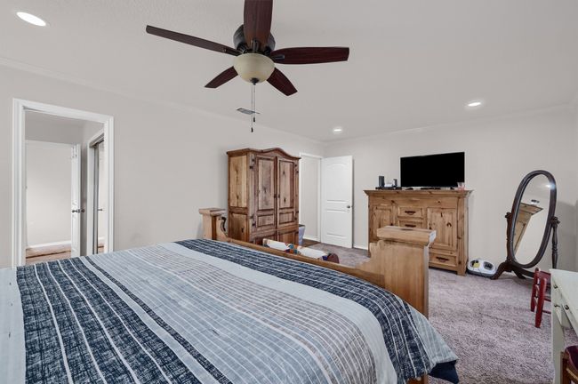 Carpeted bedroom with recessed lighting and ceiling fan | Image 17