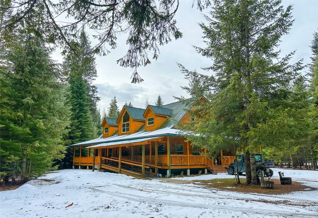 View of snow covered rear of property | Image 24