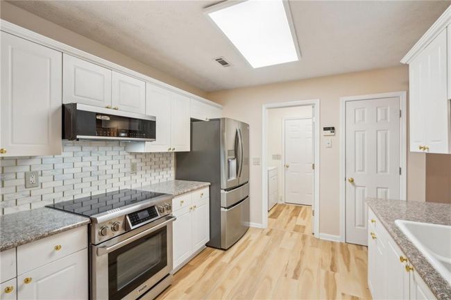 3815 Glen Laurel Ct, House other with 3 bedrooms, 3 bathrooms and 4 parking in Cumming GA | Image 5