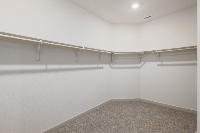 Primary bedroom walk-in closet | Image 15