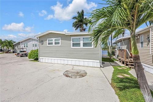 7031 Armadillo Way, FORT MYERS, FL, 33967-6046 | Card Image