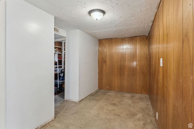 Interior space with concrete floors and wood walls | Image 23
