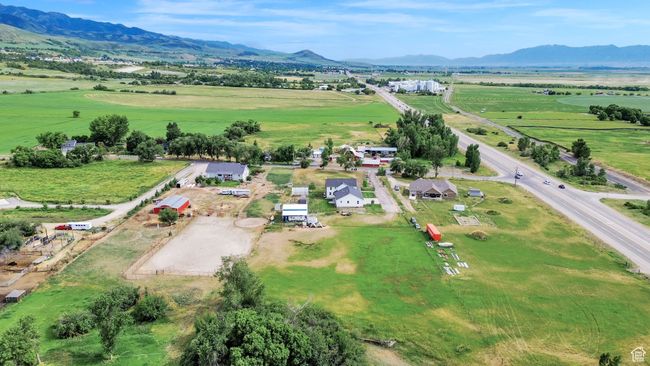 Aerial view of sparsely populated area featuring mountains | Image 81