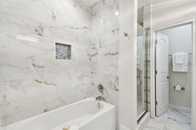The Primary bath also contains a garden tub, walk-in shower, and water closet. | Image 22