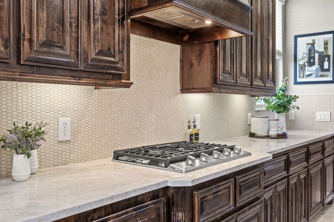 New Dacor Gas Cooktop, Taj Mahal Countertops, and Designer Picket Tile Backsplash | Image 17
