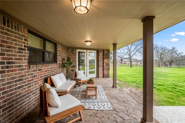 View of patio with fence and french doors | Image 43