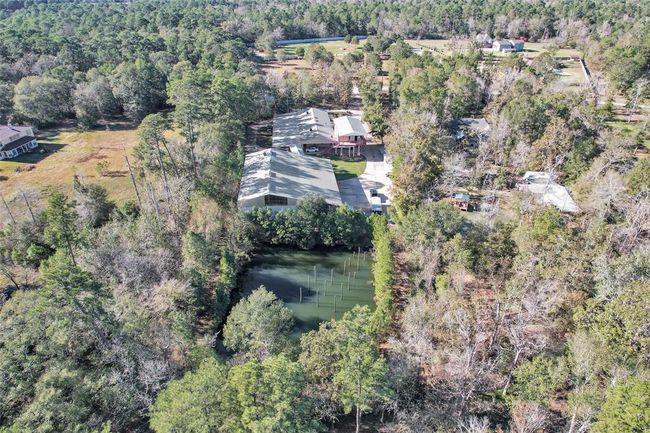 9800 Ramzi Dr, House other with 5 bedrooms, 2 bathrooms and 2 parking in Conroe TX | Image 42