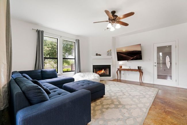 Natural light, rustic charm, and space to stretch out—this living room delivers. | Image 19