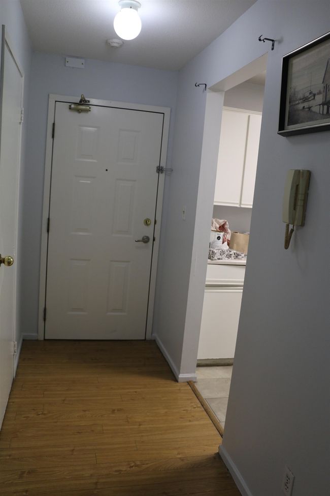 Hall with light wood-style floors | Image 6