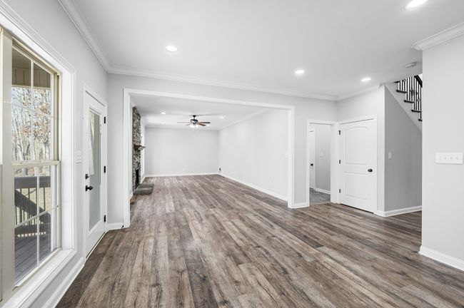 Kitchen looking to the family room. Access to the upper level porch. | Image 29