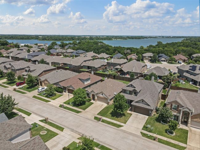 View of Lake from home, easy walk to the water, greenbelts and community pools. | Image 19