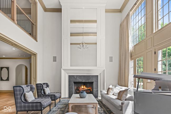 2 story room with tons of light | Image 9