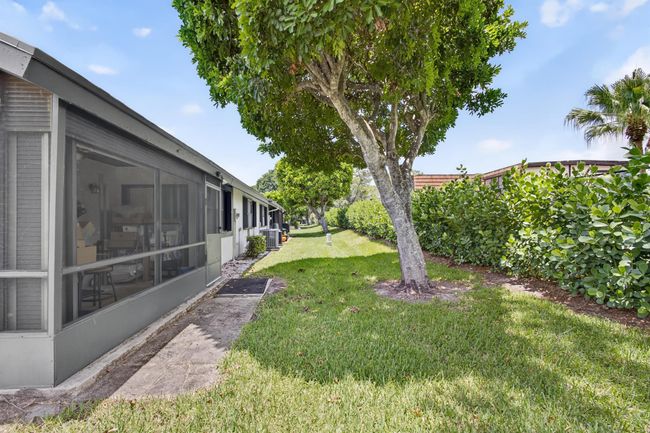 360 Quebec Ct, Condo with 3 bedrooms, 2 bathrooms and null parking in Royal Palm Beach FL | Image 48