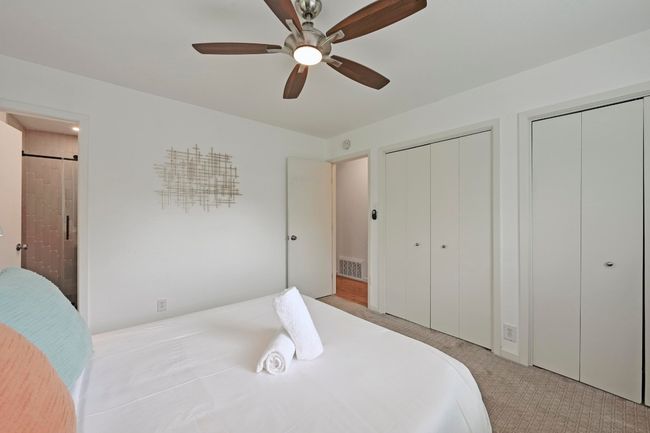 Two side by side closets in the primary suite provide excellent storage. | Image 23