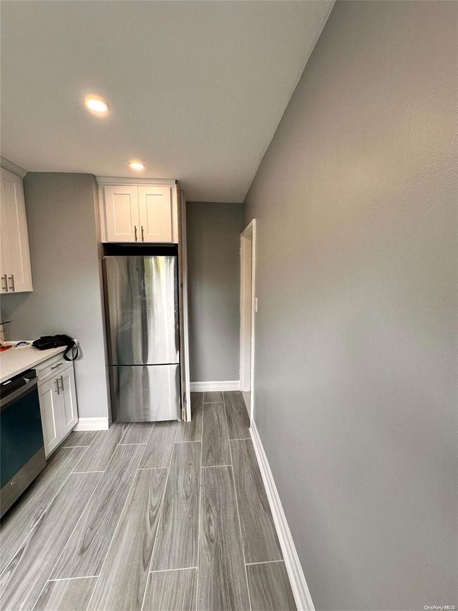 2 - 219-50 74 Th Ave, Home with 2 bedrooms, 1 bathrooms and 2 parking in Bayside NY | Image 7