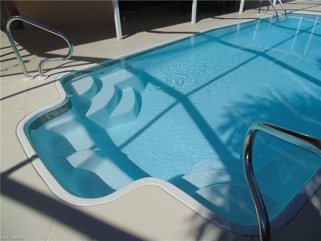 Pool featuring a patio area | Image 30