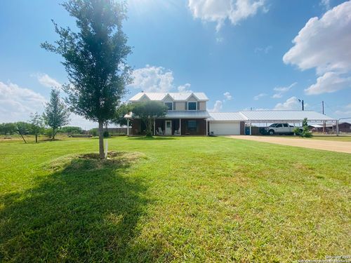 606 S Phelps St, Dilley, TX, 78017-2287 | Card Image