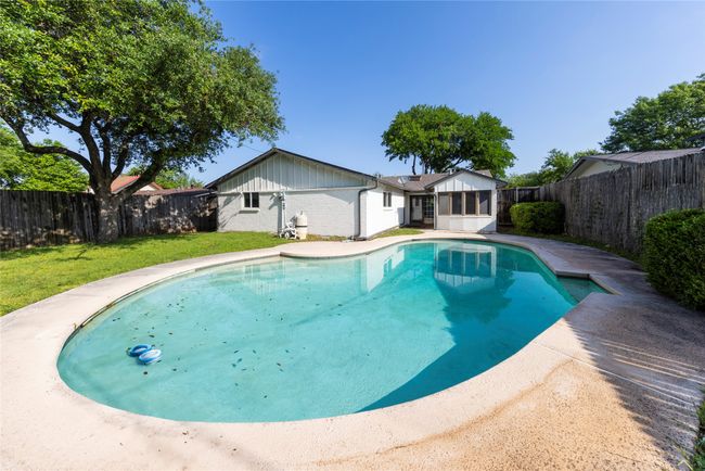 8 foot fenced back yard with private pool. | Image 5