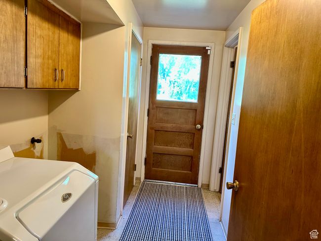 Laundry area with washer / clothes dryer and backyard access | Image 21