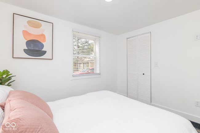 bedroom with a closet | Image 18