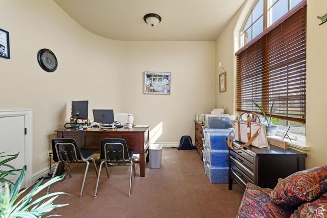 Office area with baseboards, carpet, and plenty of natural light | Image 45