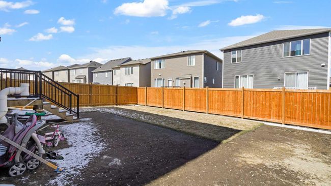 612 Windrow Manor Sw, Home with 4 bedrooms, 2 bathrooms and 4 parking in Airdrie AB | Image 40