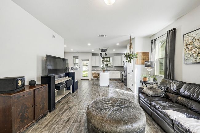 Recessed lighting throughout kitchen and dining area adding ample light to the home. | Image 7