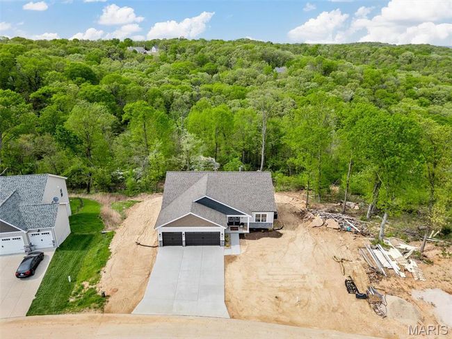 3.29 acres! Debris/materials to the right will be removed. | Image 47