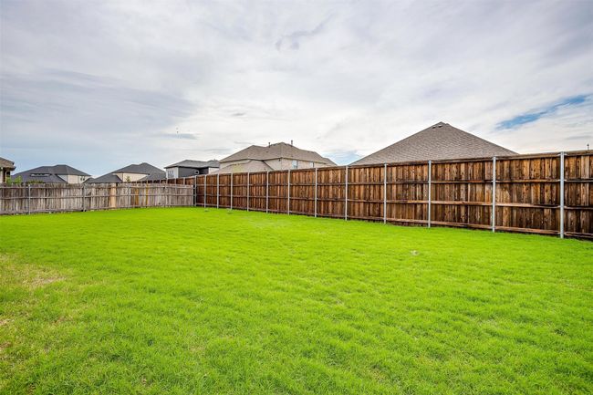 Large fully fenced backyard. | Image 31
