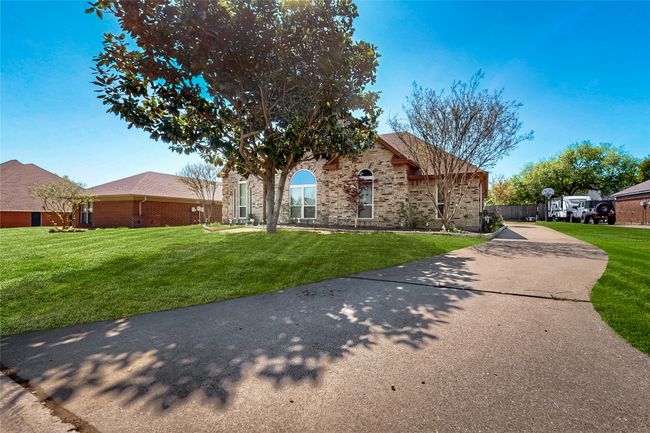 View of pool featuring a pergola, a patio area, a pool with connected hot tub, and a fenced backyard | Image 35