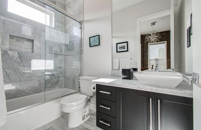 Ensuite bathroom off the secondary bedroom on the 3rd floor. | Image 23