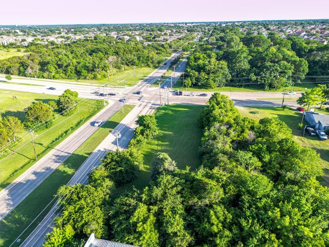 Aerial view of property's location featuring a tree filled landscape | Image 10