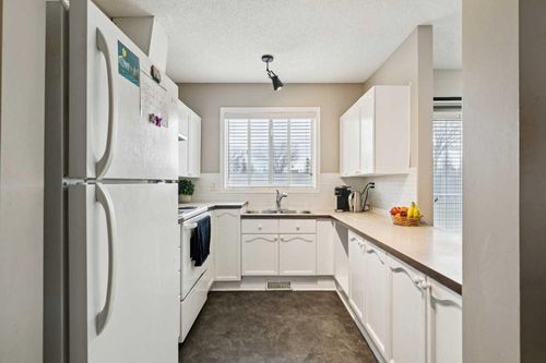 104-7 Harvest Gold Manor Ne, Calgary, AB, T3K4Y3 | Card Image