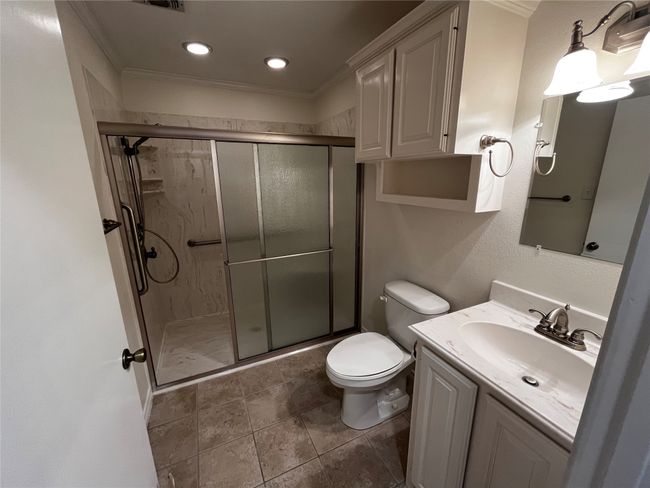 Hallway bathroom features a large walk-in shower! | Image 16