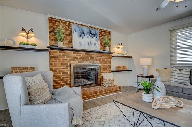Brick mantle is a stunning feature. | Image 16
