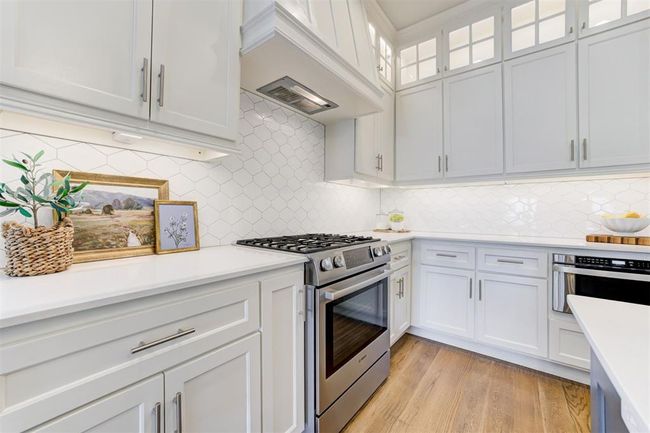 Plenty of cabinetry in the kitchen and built in appliances. | Image 10