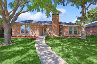 Single story home with a front yard | Image 1