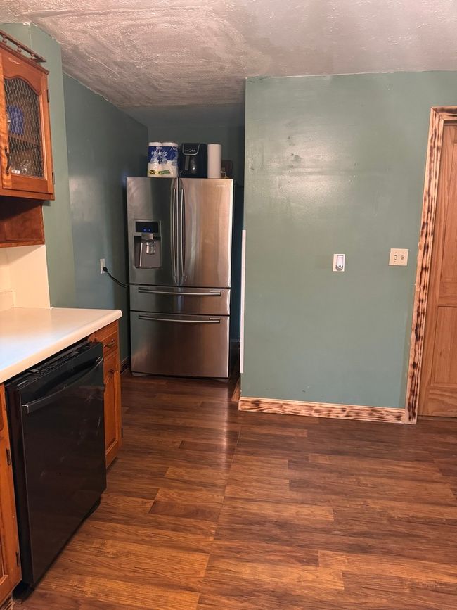 Sellers recently relocated the refrigerator to the | Image 10