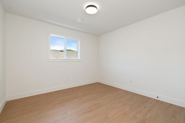 Spare room with light wood finished floors and baseboards | Image 27
