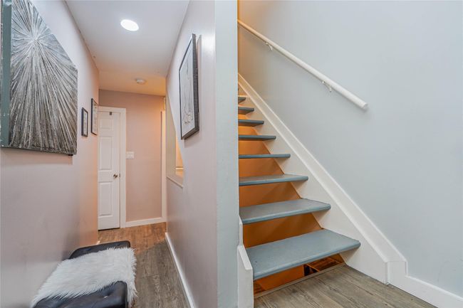Stairs featuring recessed lighting, wood finished floors, and baseboards | Image 18