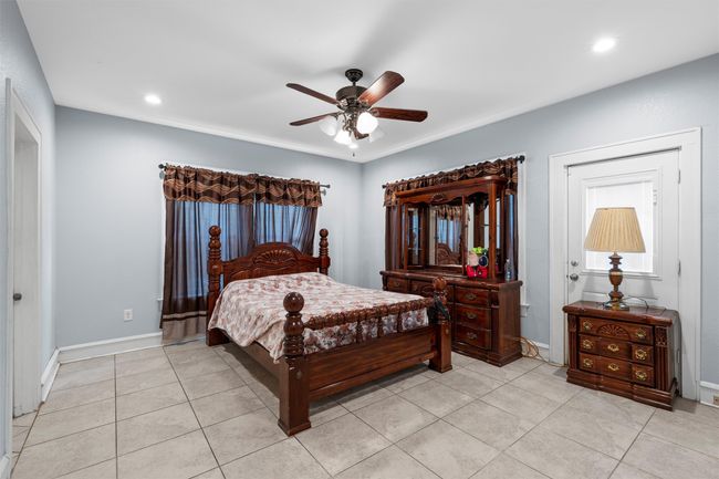Bedroom featuring recessed lighting, light tile patterned flooring, and ceiling fan | Image 14