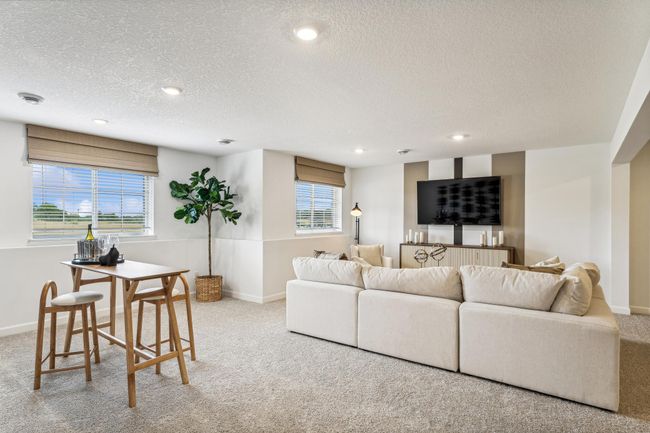 Photo is of the actual model. The finished basement provides a recreation room, a 3rd bedroom and bath. | Image 14