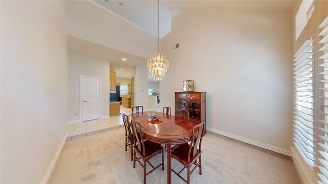 Formal Dining area with high vaulted ceiling | Image 6