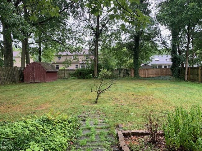View of yard featuring a storage shed | Image 3