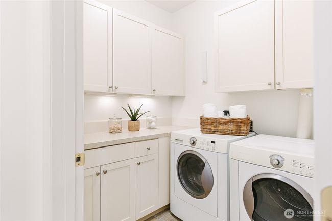 Laundry room with more storage. | Image 26