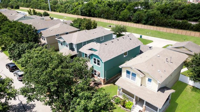 All of the homes have rear garages accessed through alleyways, giving the street view of the homes beautiful curb appeal. | Image 31