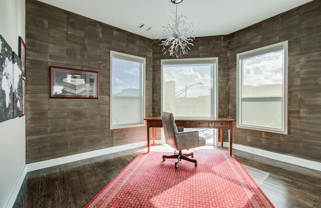 Large secondary bedroom currently used as on office, located on the 3rd floor. | Image 21