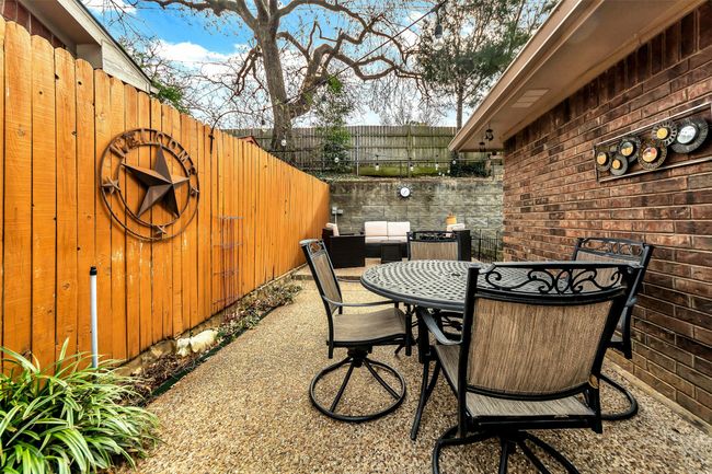 View of patio featuring outdoor dining space | Image 27