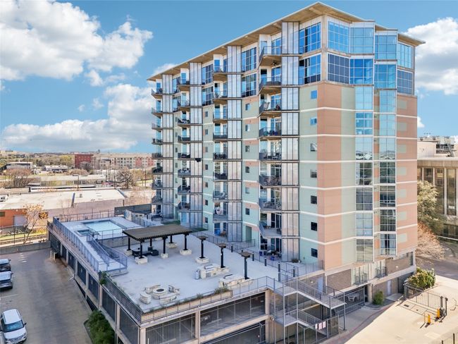 2nd FL amenity deck w/grills, fire pit, pool. | Image 37